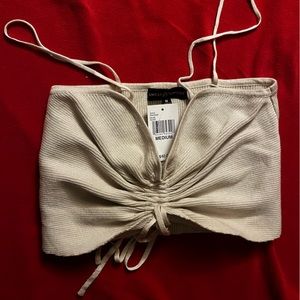 Almost famous size medium color nude